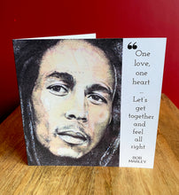 Load image into Gallery viewer, Bob Marley Greeting Card. Printed drawing over map of Jamaica. Blank Inside

