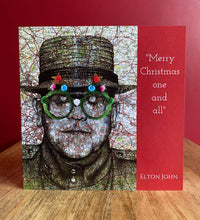 Load image into Gallery viewer, Elton John inspired Christmas Card. Pen drawing over map. Blank inside
