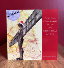 Load image into Gallery viewer, Angel of the North Christmas Card. Pen drawing over map of Newcastle/ Gateshead.
