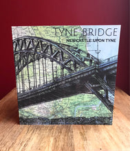 Load image into Gallery viewer, Tyne Bridge, Newcastle Greeting Card. Printed drawing over map of North East England. Blank inside
