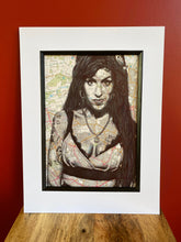 Load image into Gallery viewer, Amy Winehouse Art Print. Portrait in pen over map of North London. A4 Unframed.

