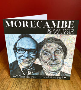 Morecambe and Wise Greeting Card.Printed drawing over maps. Blank inside.